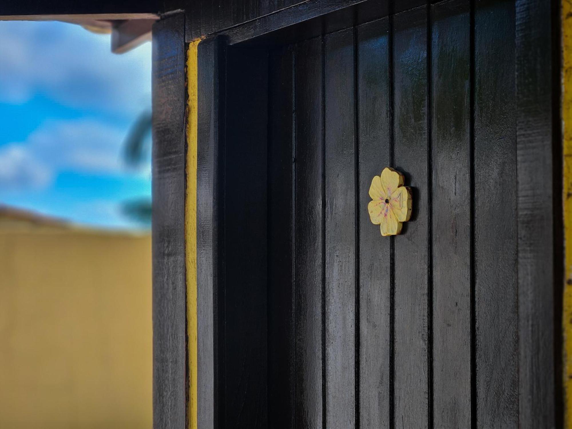 Bella Vista Ocean View Hotel Búzios Eksteriør billede A golden flower-shaped knob on a door